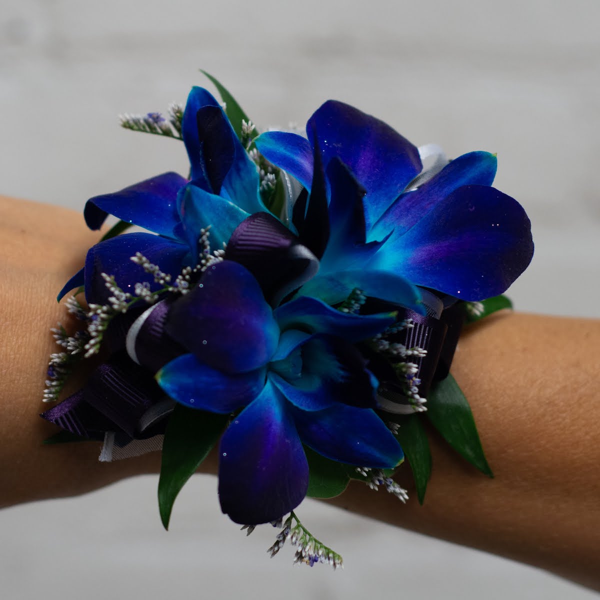 Blue Orchid Corsage – Brown's The Florist BD Canada